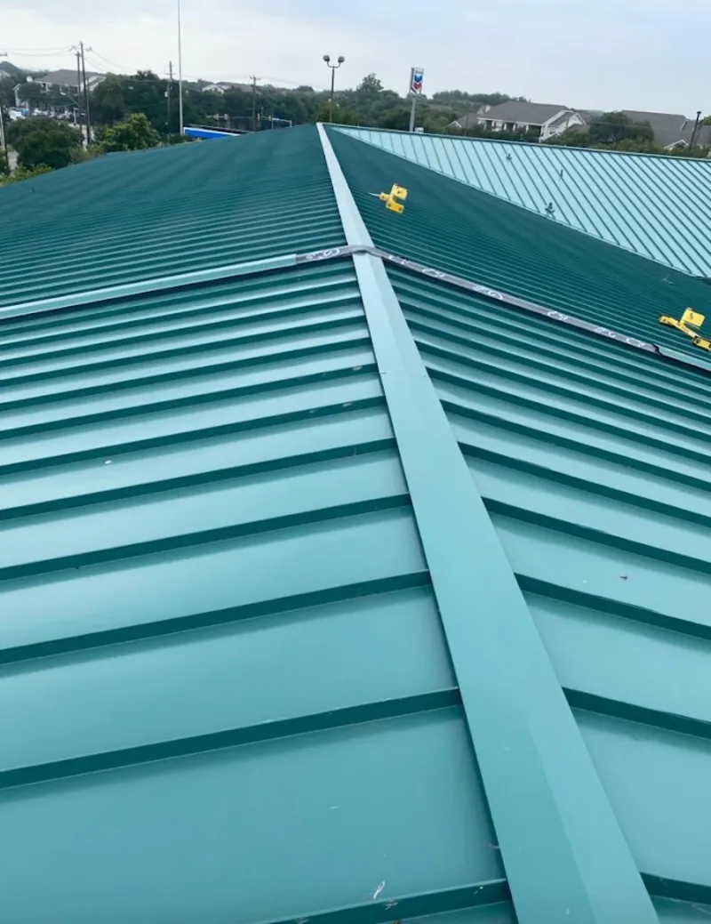 Green commercial metal roof ridge and valley for Metal Roof Repair in Fairwood